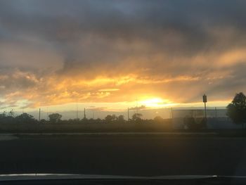 Scenic view of silhouette landscape against sky during sunset