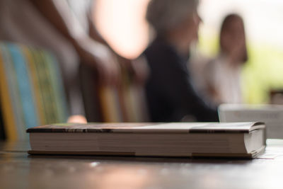 Close-up of mobile phone on table