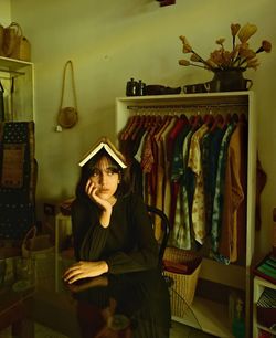 Portrait of woman standing in store