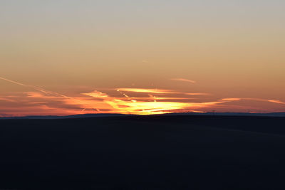 Scenic view of dramatic sky during sunset