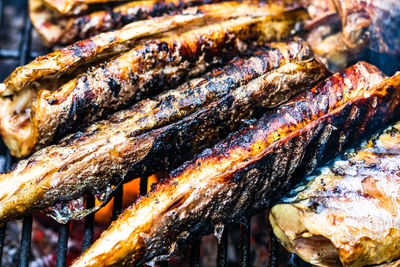 High angle view of meat on barbecue