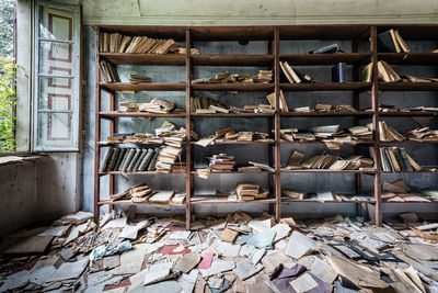 Bookshelf wood in abandoned villa