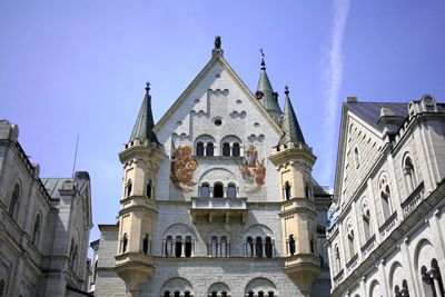 Low angle view of church against blue sky