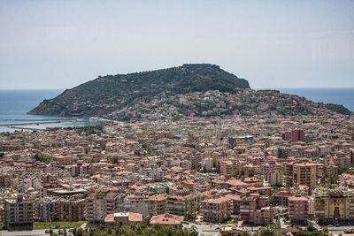 Aerial view of cityscape against clear sky