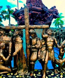 Low angle view of statue against building