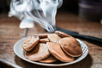 High angle view of bread in plate on table