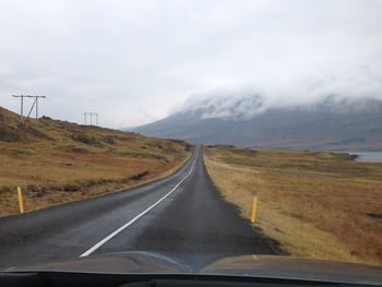 Country road passing through landscape