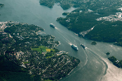 Aerial view of nautical vessel passing through bay