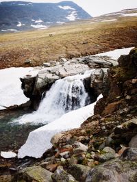 River flowing through rocks