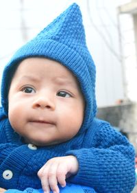 Portrait of cute baby girl in winter