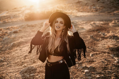 Young woman standing outdoors