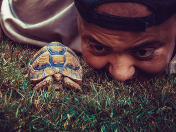 Man with turtle