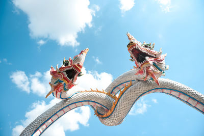 Low angle view of statue against sky