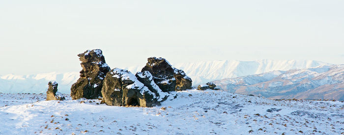 Scenic view of snowcapped mountain against sky