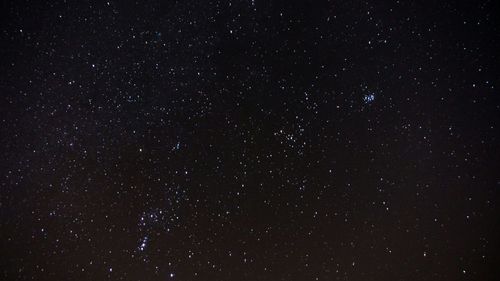 Low angle view of stars in sky