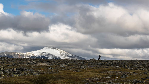 Scenic view of snowcapped mountain against sky