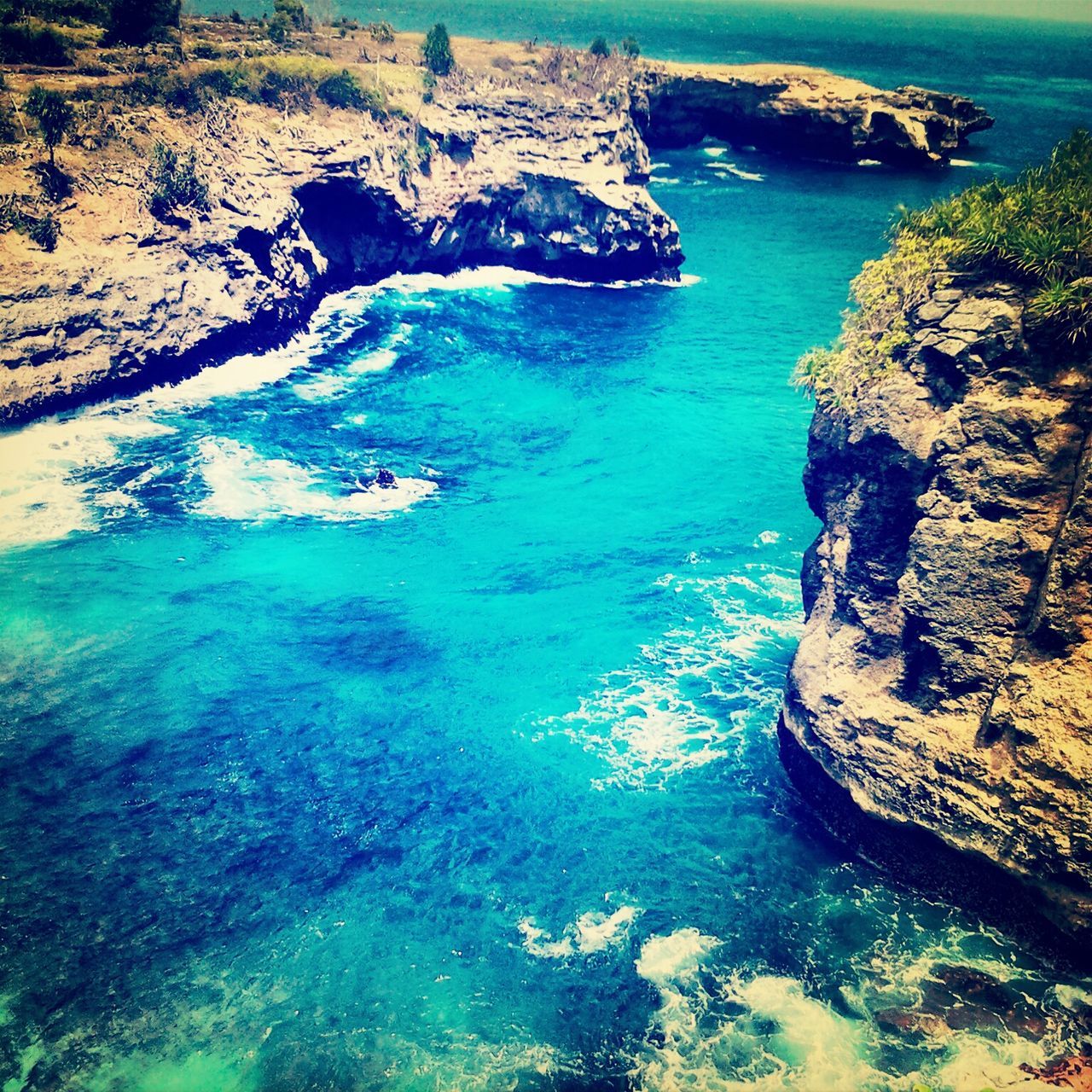 water, sea, high angle view, beauty in nature, rock formation, scenics, tranquil scene, nature, tranquility, rock - object, blue, cliff, rock, idyllic, coastline, turquoise colored, day, outdoors, sunlight, no people