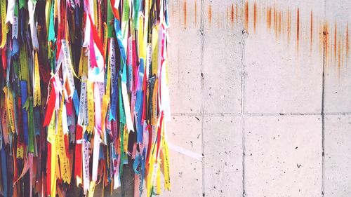 Colorful ribbons hanging on wall
