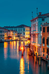 Buildings in city at night