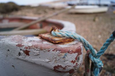 Close-up of rope tied on metal