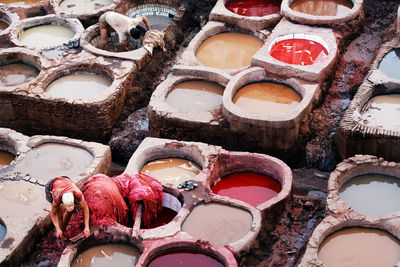 High angle view of people working at tanneries
