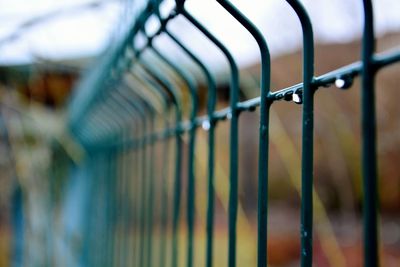 Close-up of barbed wire fence