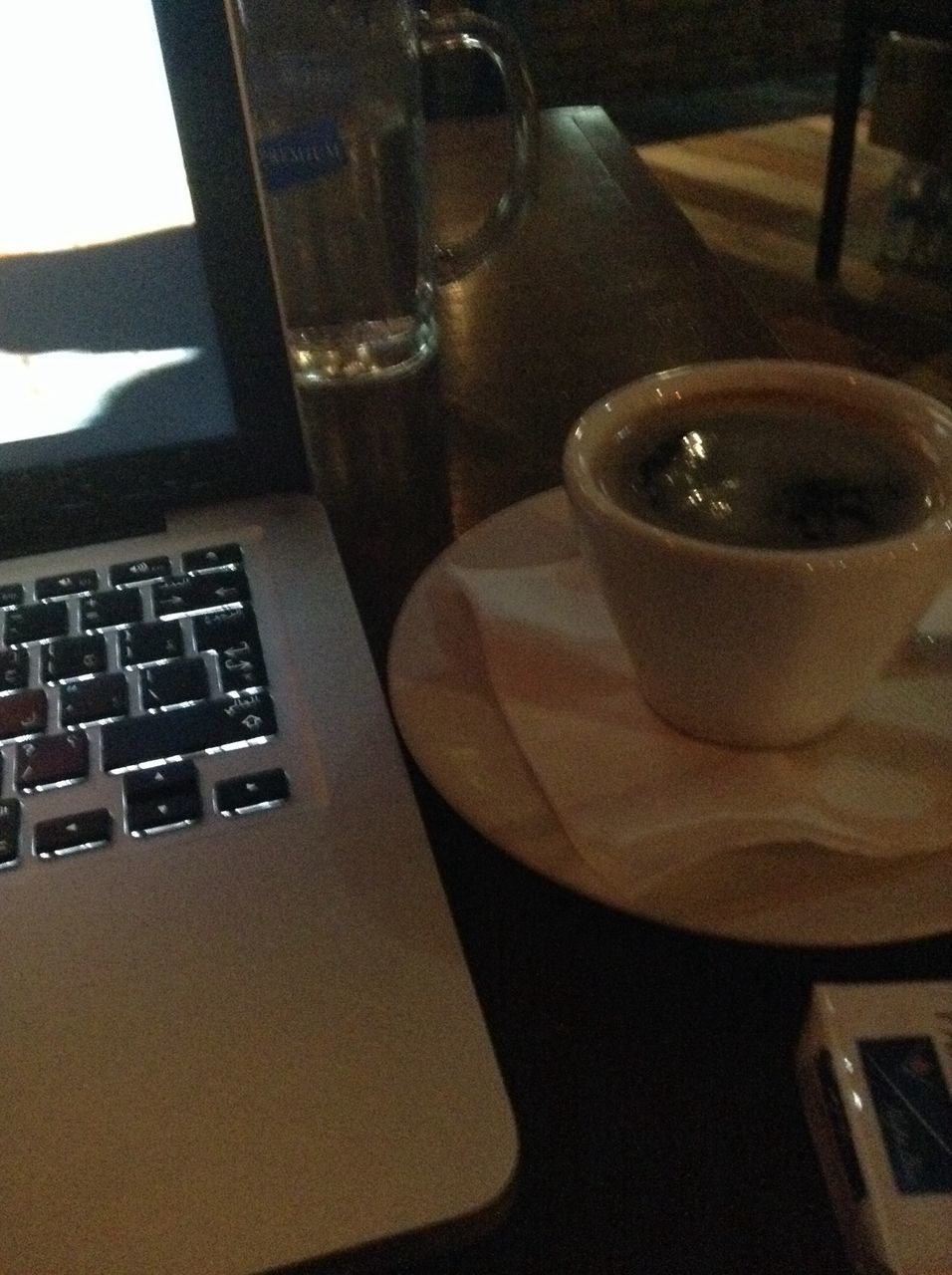 indoors, table, drink, coffee cup, food and drink, refreshment, still life, close-up, coffee - drink, technology, communication, cup, wireless technology, laptop, coffee, no people, home interior, glass - material, auto post production filter, computer keyboard