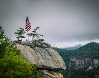 Low angle view of american flag against clear sky