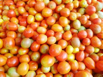 Full frame shot of tomatoes at market stall