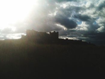 Built structure against cloudy sky