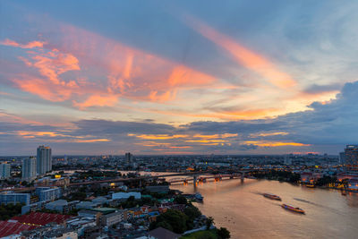 High angle view of cityscape against sky during sunset