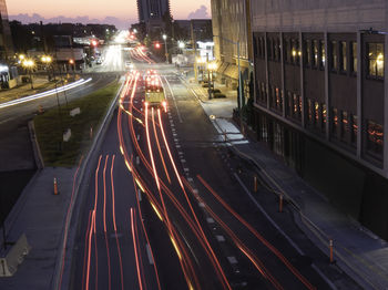 High angle view of light trails on road at night