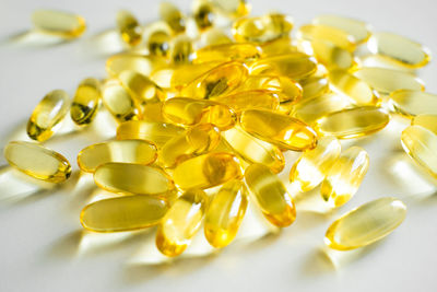 Close-up of pills on white background