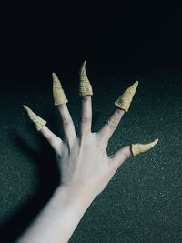 Close-up of woman hand holding paper