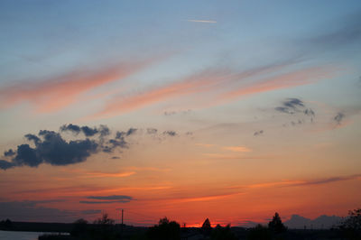 Scenic view of dramatic sky during sunset