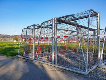 View of soccer field against clear sky