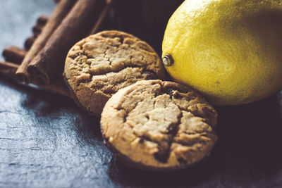 Close-up of cookies and lemon