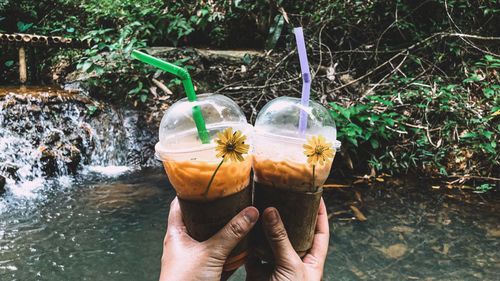 Midsection of person holding ice cream cone