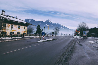 Road with houses in background