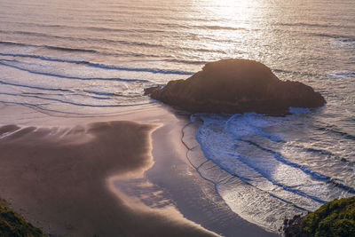 High angle view of sea during sunset