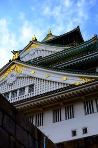 Low angle view of temple building against sky