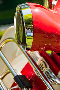 High angle view of reflection of car on side-view mirror