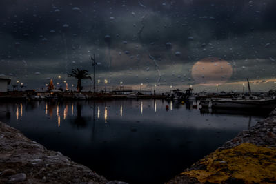 Scenic view of sea against sky at night