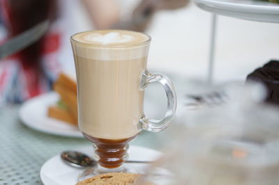 Close-up of coffee cup on table