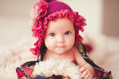 Portrait of young woman wearing santa hat