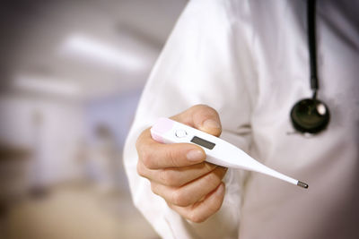 Close-up of woman holding hands