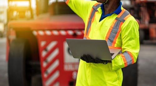 Man working on mobile phone