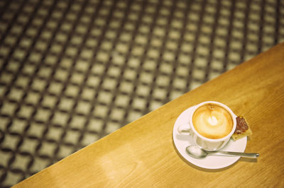 Close-up of cappuccino on table