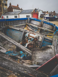 Abandoned boat moored in water