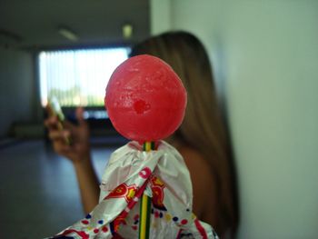 Close-up of person with balloon balloons